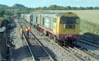 Gently does it. 20165, and friend, pass Carmuirs West box at low speed in 1990. An operation to replace long bladed points, to allow higher speed running, the previous night had gone badly, and the originals had been re-fitted. This train was heading east.<br><br>[Ewan Crawford //1990]