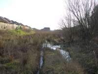 The solum of the railway survives for a distance east of the site of Broomhouse station past the new Belway housing, but has been built upon near the site of the bridge at Baillieston Road, shortly east of which which was Calderpark Halt. <br><br>[Colin McDonald 14/02/2017]