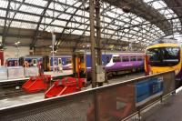 Trains at the buffers at Liverpool Lime Street on 12 March 2015. Following the wall collapse in the cutting to the east of the station on 28 February 2017 [see news item], the station had been closed while Network Rail staff worked to clear the debris, carry out stabilisation work and repair OHLE and signalling. Services are now scheduled to restart 24 hrs earlier than expected on 8 March 2017.<br><br>[John McIntyre 12/03/2015]