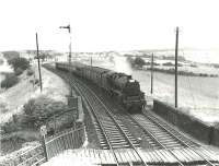 Kingmoor Black 5 45081 approaching Cumnock from the south in the summer of 1961 at the head of a Glasgow bound express. [Ref query 901] <br><br>[G H Robin collection by courtesy of the Mitchell Library, Glasgow 29/07/1961]