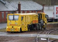 Taking a rest from the nightly grind, a Strabag SF02 road-rail milling unit waits at Network Rail's Shettleston depot on 22 February 2017.<br><br>[Colin McDonald 22/02/2017]