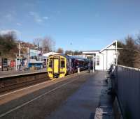 A Fife to Edinburgh service calls at Inverkeithing on 28/02/2017. The lamp columns on this half of the platform have been removed and replaced with strip lights on the fence. The back of the platform overhangs the Keithing Burn here and presumably the columns were considered to be adding unnecessary weight.<br><br>[David Panton 28/02/2017]