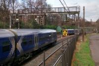 After a short stop the unit in the foreground heads away from us, signalled for the 'Y' line into Waverley, after the one on the distance has cleared the points. Photographed 10/03/2017.<br><br>[David Panton 10/03/2017]