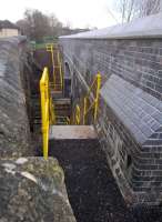 The old S&D bridge over the GWR line [see image 37063] has now been replaced, with walls high enough to deter persons ignorant of the power of electricity from dangling conductive objects onto the overhead lines. NR staff have steps on both sides for access for electrification. View looks South, towards the Two Tunnels.<br><br>[Ken Strachan 05/03/2017]