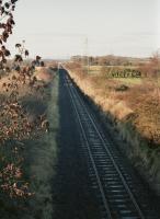 Looking west from Lundin Road bridge, a little to the west of the the former Whitemyre Junction, along the Stirling & Dunfermline Railway.  With the closure of Comrie Colliery, track-lifting was under way.<br><br>[Bill Roberton //1985]