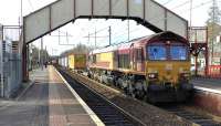 DB Cargo no.66103 passes Holytown working 4E99 from Mossend Euroterminal to Tees Dock BSC Export Berth<br><br>[Ken Browne 09/03/2017]