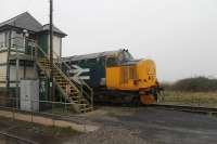 37402 emerges from behind Foxfield signal box after calling with a Cumbrian Coast service from Barrow to Carlisle on 11th March 2017. <br><br>[Mark Bartlett 11/03/2017]