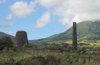 An abandoned Sugar Mill on St Kitts, seen from a passing train. The railway was built to connect the various plantations with a new sugar factory in Basseterre that opened in 1912 and the small mills like this were all closed although many can still be seen.<br><br>[Mark Bartlett 18/02/2017]