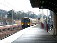 SPT liveried 318266 runs into the terminus at Lanark in March 2003 with a mid morning service from Dalmuir. The front destination panel has already been set for the return journey, scheduled to get underway twelve minutes later. <br><br>[John Furnevel 16/03/2003]