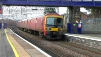 Royal Mail emu 325001 approaching Motherwell on 9 March 2017 working ecs to Shieldmuir Mail Terminal, from where it would later form 1M03 to Warrington.<br><br>[Ken Browne 09/03/2017]