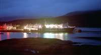 The 'Lord of the Isles' tying up at Lochboisdale Pier in August 1993. It was somewhat wet. The next morning she continued to Castlebay, Barra.<br><br>[Ewan Crawford /08/1993]