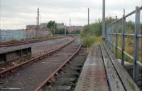 View towards Shettleston Junction in 1988 with the Airdrie line off to the right (that's the junction signalbox on the right too). The catenary had just been removed and the 'Bothwell Sidings' slightly cut back. Access by kind permission of British Rail.<br><br>[Ewan Crawford //1988]