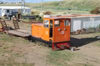 Hunslet 0-6-0DH No. 15 of the St Kitts Railway (HE 9086/1982) sits in the sunshine outside Needsmust Depot, alongside the international airport. This 160hp loco is another survivor from what was once a large fleet used on sugar cane traffic until 2005 on the 30 mile line that circled the island. It has been retained/preserved by the St Kitts Scenic Railway for p/way duties. <br><br>[Mark Bartlett 18/02/2017]