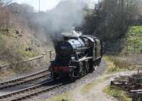 Visiting 8F 2-8-0 48624 climbs up the steeply graded curve from Bury Knowsley St to Bolton St with a train from Heywood to Rawtenstall on 25th March 2017. This is the view from the rear windows of Bury South signal box taken during a supervised visit.<br><br>[Mark Bartlett 25/03/2017]