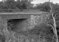 Took a while to find the location on Google Earth!  This bridge carried a minor road from Middleton to Temple over a railway (tramway?) from Middleton Quarry to Middleton Limeworks.  No physical connection to the Esperston line and may have been narrow gauge. Looking north to road bridge.<br><br>[Bill Roberton //1994]