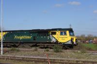 Freightliner 70005 on an eastbound train through Didcot in March 2017.<br><br>[Peter Todd 15/03/2017]