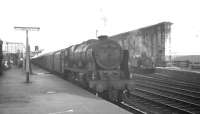 Royal Scot 46118 <I>Royal Welch Fusilier</I> stands with a train at Carlisle platform 1 in August 1963. A 'Jinty' on station pilot duty takes a break in the background.<br><br>[K A Gray 24/08/1963]