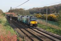 After a week of light engine runs DRS 88002 <I>Prometheus</I> undertook a loaded test from Carlisle to Crewe on 3rd April 2017. The brand new electro diesel is seen at Woodacre with the heavy stone train, and 68025 <I>Superb</I> dead-in-train for insurance purposes. <br><br>[Mark Bartlett 03/04/2017]
