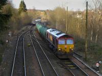 66111 enters Dunblane with the empty fuel tanks from Lairg on 27 February 2016.  Switch of this traffic to road transport has been announced.<br><br>[Bill Roberton 27/02/2016]