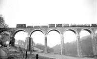 The Greenlaw goods crossing Leaderfoot Viaduct at Easter time in 1965 on its way back to St Boswells.<br><br>[Bruce McCartney //1965]