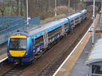 BTP-branded 170407 draws away from Dalgety Bay with a Fife Inner Circle service on 28 March.<br><br>[Bill Roberton 28/03/2017]