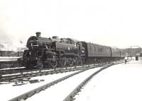 Standard tank 80115 leaving Paisley Gilmour Street on 21 March 1955 with a train for Gourock. The locomotive had arrived at Polmadie new from Doncaster 3 months earlier. [Ref query 990] <br><br>[G H Robin collection by courtesy of the Mitchell Library, Glasgow 21/03/1955]