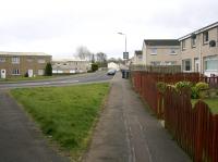 View south of the site of Bothwell Junction today. The line from Bothwell station ran through the houses and gardens on the right and continued behind the camera towards Uddingston East. To the left, the line which forked off to run north east towards Whifflet almost followed the bend in the Hume Drive. In between was a series sets of points  leading to sidings.<br><br>[Colin McDonald 26/03/2017]