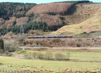 The 0729 Manchester Airport - Edinburgh Waverley climbing Beattock bank north of Greskine on 27 March 2017.<br><br>[John Furnevel 27/03/2017]