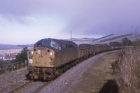 Begrimed Class 40 No. D278 passes Newburgh with a lengthy Millerhill - Perth working on 10th April 1969.  The location is halfway between the 1st and 2nd stations.  Prior to 1960, four tracks existed at this point - two running lines & two sidings.<br><br>[Graeme Blair 10/04/1969]