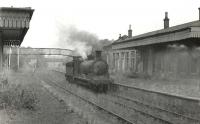 J36 0-6-0 65295 of Parkhead shed, photographed at Bothwell (NB) on 19 September 1959, more than four years after the station had closed to passengers. [Ref query 994]<br><br>[G H Robin collection by courtesy of the Mitchell Library, Glasgow 19/09/1955]