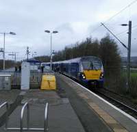 A 334 on an Edinburgh service calls at Dumbarton East on 01/04/2017.<br><br>[David Panton 01/04/2017]