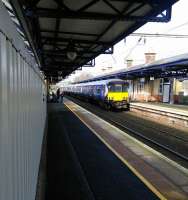 A Balloch to Airdrie service calls at Dumbarton Central on 01/04/2017.<br><br>[David Panton 01/04/2017]