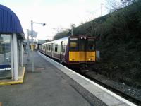 A 314 for Neilston at Pollokshaws East on 01/04/2017. Note that it still in SPT carmine and cream livery.<br><br>[David Panton 01/04/2017]