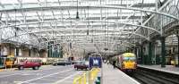 The car parking area at Glasgow Central in July 2005, looking back towards the station concourse. At this point details were being finalised regarding the removal of the parking facilities to make way for the creation of two new platforms which would cater for trains on the planned Glasgow Airport Rail Link, entering the station via the arch directly behind the camera. [See image 40518]<br><br>[John Furnevel 01/07/2005]