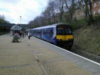 320 317 with an incoming circle service at Pollokshields West on 01/04/2017. You have to wonder what the people of this fairly comfortable suburb have done to deserve these station 'facilities'.<br><br>[David Panton 01/04/2017]