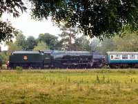Arriving at Wymondham during the Mid Norfolk Railway Steam Gala on 24 June 2016 is Stanier Coronation Pacific no 46233 <I>Duchess of Sutherland</I>.<br><br>[Ian Dinmore 24/06/2016]