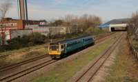 Swansea to Cardiff service passing TATA Steel Margam Works General offices.<br><br>[Alastair McLellan 03/04/2017]