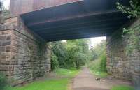 East of East Kilbride on the closed line through to Blantyre and Hamilton. This location was close to the Mavor and Coulson Works, the view looks north-east. Grand ambitions here with a huge bridge to cross a double track. Arguably the Lanarkshire and Ayrshire Railway (and gradients) killed this as a through route for imported ore to the Lanarkshire iron and steel works.<br><br>[Ewan Crawford //2000]