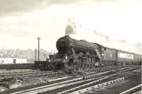 Haymarket A3 Pacific 60101 <I>Cicero</I> charges through Cowlairs West Junction on 3 April 1956 at the head of the 6pm Glasgow Queen Street - Edinburgh Waverley.  <br><br>[G H Robin collection by courtesy of the Mitchell Library, Glasgow 03/04/1956]