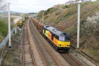 After a lengthy absence (reportedly due to work at the paper mill) the log trains from Carlisle to Chirk have started running regularly again. Colas 60095 powers the long train south through Hest Bank on 6th April 2017<br><br>[Mark Bartlett 06/04/2017]