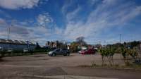 The 6th April, Coupar Angus, almost the same vantage point of an older picture looking at the former goods yard [[see image 24848]]. Now used car sales where once were freight wagons and locomotives.<br><br>[Alan Cormack 06/04/2017]