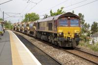 66186 takes a Network Rail ballast train south and into Millerhill yard.<br><br>[Colin McDonald 04/06/2015]