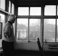 Under the watchful eye of signalman Jas. Colquhoun, an East Kilbride bound DMU is seen from Busby Junction signal box.<br><br>[Ian Millar 29/01/1974]