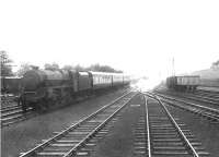 Class 5 4-6-0 45169 approaching Castle Douglas westbound on 14 July 1956 at the head of a Dumfries - Stranraer train. [Ref query 1000]<br><br>[G H Robin collection by courtesy of the Mitchell Library, Glasgow 14/07/1956]