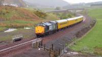 37604 on a NR Test Train running slowly just south of Heriot heading north to Edinburgh on the then unopned Borders Rail on 12/5/15.<br><br>[Jeffray Wotherspoon 12/05/2015]