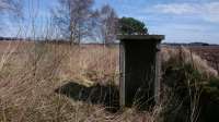 Just to the east of the crossing in Eassie, there is a cabin with the door long gone. Gary Straiton comments: It's a Fogmans hut. Positioned at Distant signals (in this case Eassie's Up Distant?) and manned in times of poor visibility. Detonators were put on the line to warn drivers of their location.<br><br>[Alan Cormack 06/04/2017]