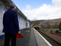 A Class 156 DMU from Oban slowly approaches Crianlarich before coupling to the rear of a double 156 unit from Fort William which is already in the platform.<br><br>[Colin McDonald 12/04/2017]