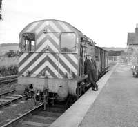 Platform scene at Earlston, looking west at Easter time 1965, with the branch pickup goods paused on its outward journey from St Boswells to Greenlaw.<br><br>[Bruce McCartney //1965]