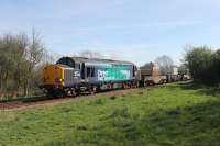 <I>Portrait of a veteran.</I> DRS 37059 leads three flasks from Heysham along the Bare Lane to Hest Bank chord on 12th April 2017. The former D6759 went new to Thornaby in October 1962 and so is approaching its 55th birthday, still in front line service. Sister 37069 is out of sight bringing up the rear.<br><br>[Mark Bartlett 12/04/2017]