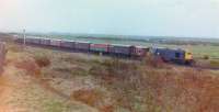 Class 20 No 20179 swinging onto the Troon loop at Lochgreen Junction with a northbound freight, 29 October, 1982, shortly before the junction closed, along with the Troon avoiding line, 27 November, 1982.<br><br>[Robert Blane 29/10/1982]